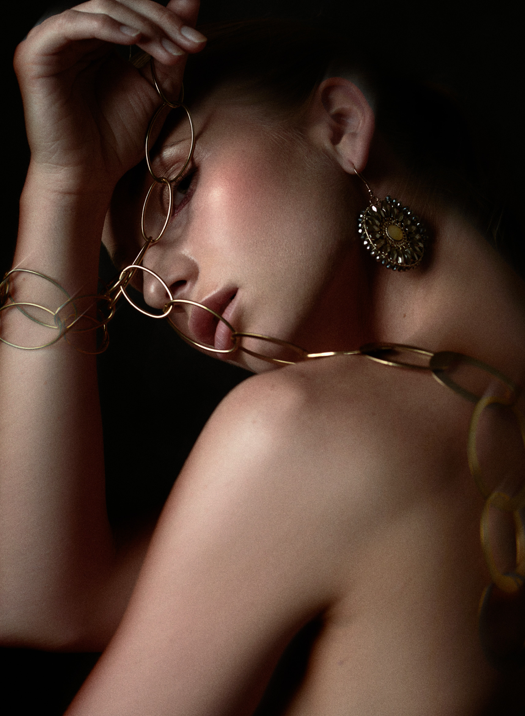 Girl showing Jewellery Set