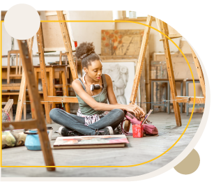 Woman Sitting In Artist Studio Photo