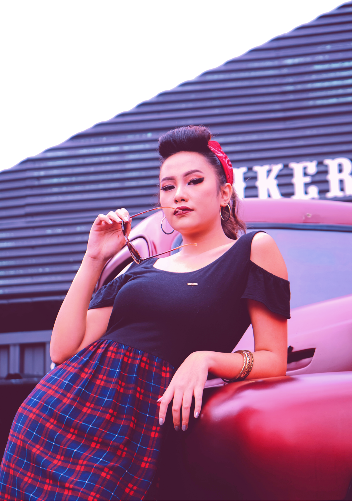 Vintage style woman with black shirt and kilt