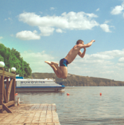 man jumping into water