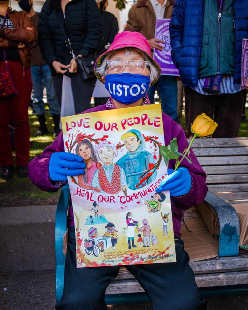 Woman holding a protest sign